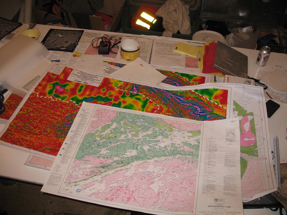 Table with geographical assessment maps